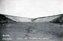 Water flowing through the inlet of the Brooks Aqueduct